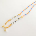 Glass holder Beach please